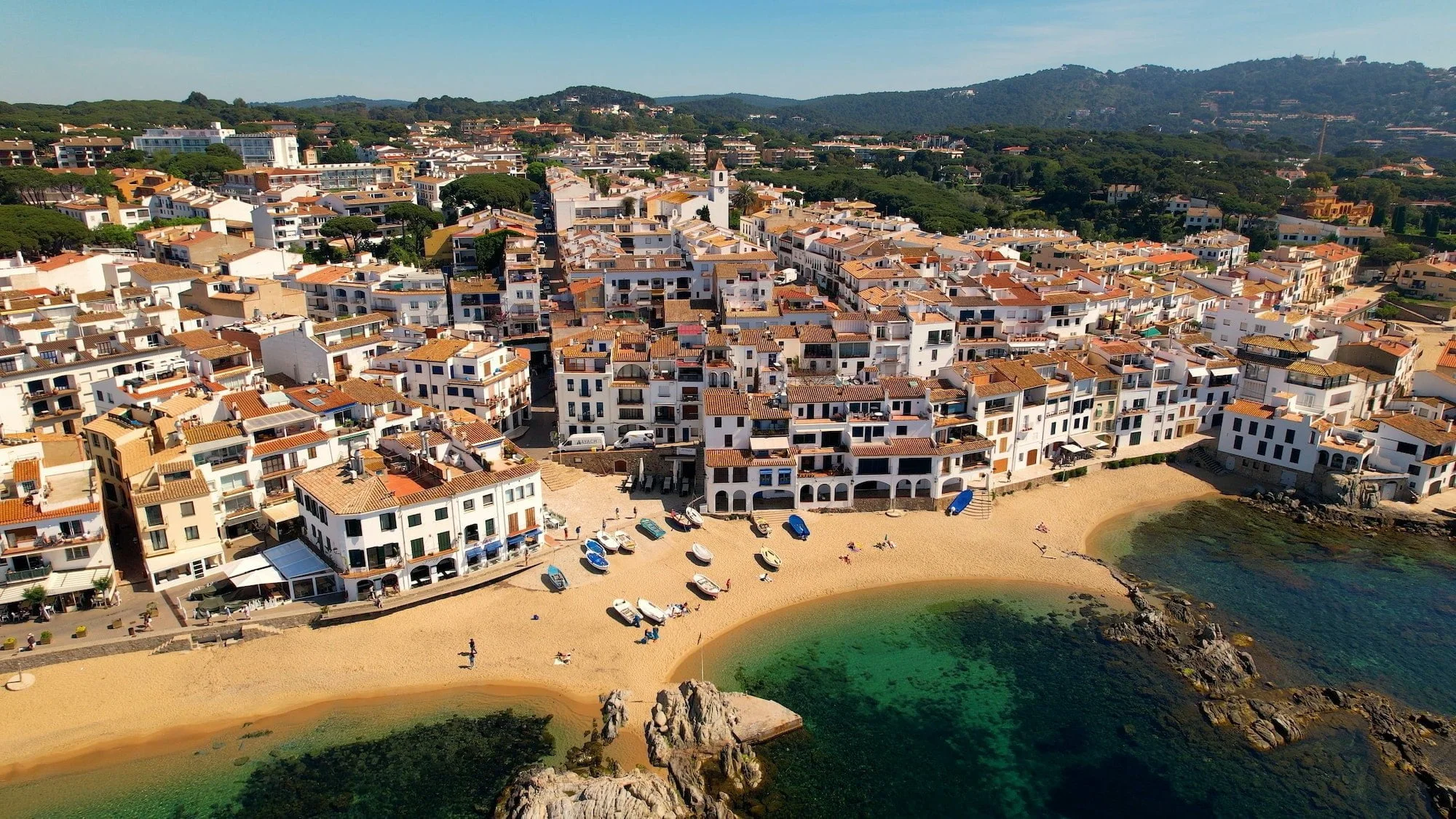 Aerial view of Costa Brava paradise beach in summer. Calella de Palafrugell village